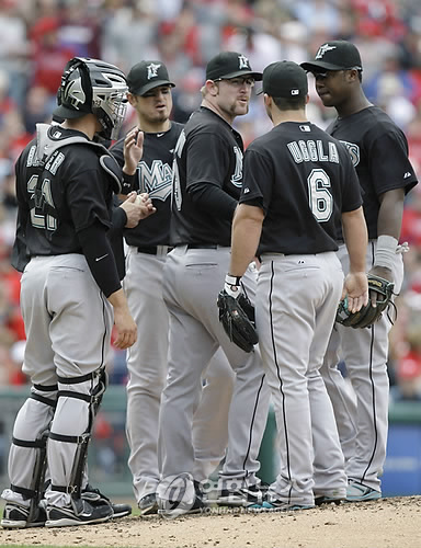 Florida Marlins Jorge Cantu, right, is congratulated by teammate Hanley  Ramirez after hitting a solo home run in the fourth inning of a baseball  game against the Washington Nationals in Miami, Friday