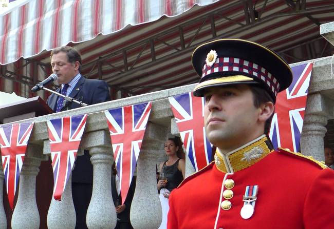 British Ambassador Charles Hay (left) speaks at a reception marking the 90th birthday of Queen Elizabeth II at the embassy in Seoul on Thursday. (Joel Lee / The Korea Herald)