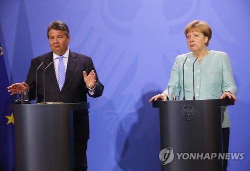 독일 메르켈 총리와 가브리엘 부총리 (AFP=연합뉴스)