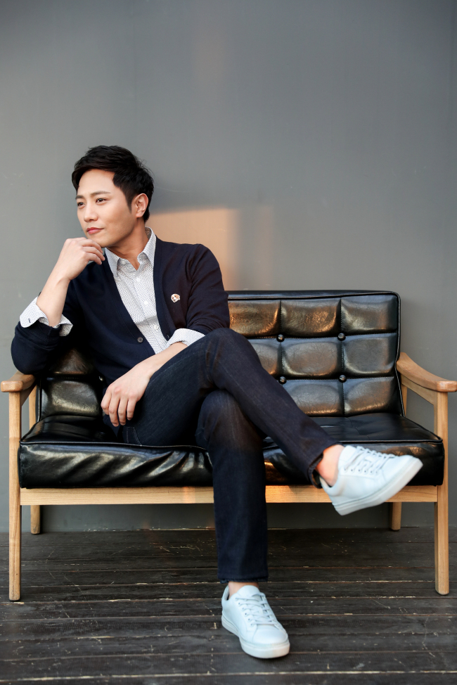 Jin Goo poses for a photo before an interview Monday at a cafe in Palpan-dong, Seoul. (NEW)