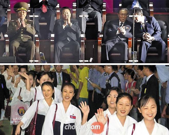 2014년 인천아시안게임때 황병서·최룡해·김양건 깜짝 방문(사진 위). 2003년 대구유니버시아드땐 여성 응원단 파견(사진 아래) - 2014년 10월 당시 황병서 북한 인민군 총정치국장, 최룡해 노동당 비서, 김양건 노동당 통일전선부장(위 사진 왼쪽부터)이 인천아시아드 주경기장에서 열린 ‘2014인천아시안게임’ 폐막식에 참석해 공연을 관람하고 있다. 김 통일전선부장 오른쪽은 류길재 당시 통일부장관. 아래 사진은 2003년 8월 대구 하계유니버시아드 대회에 참가한 북한 선수단을 응원하기 위해 북한 여성 응원단이 김해공항을 통해 입국하는 장면. /남강호 기자