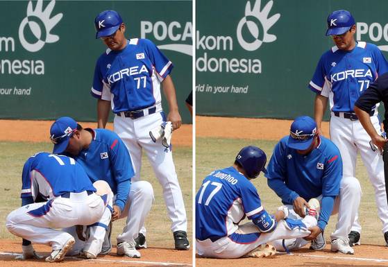 1루 코치이자 이정후의 아버지인 이종범이 아들을 지켜보고 있다. 자카르타=김성룡 기자