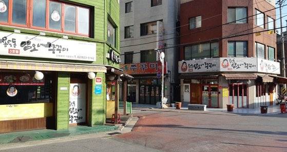 용두동 주꾸미 골목. 신당동 떡볶이 골목이나 신림동 순대 타운처럼 식당이 밀집한 대규모 상권이 아니다. [사진 박헌정]