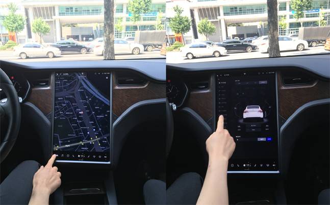 테슬라 모델X 전장 기능의 모든 것을 담고 있는 터치스크린. 센터페시아의 대부분을 차지할 만큼 큰 사이즈를 자랑하며, 내비게이션(왼쪽)은 물론 도어 개폐(오른쪽) 등 여러가지 기능을 이 터치스크린을 통해 조작한다. ⓒ데일리안 박영국 기자