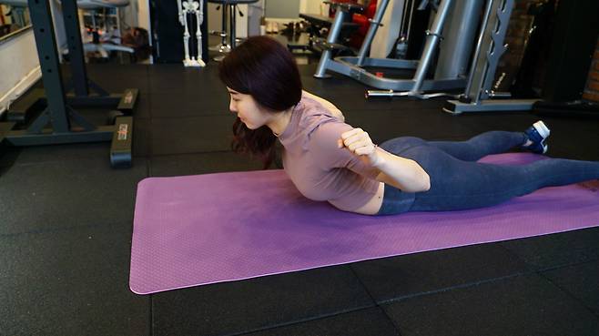 Superman -- works your erector spinae muscles (Park Su-bin / The Korea Herald)