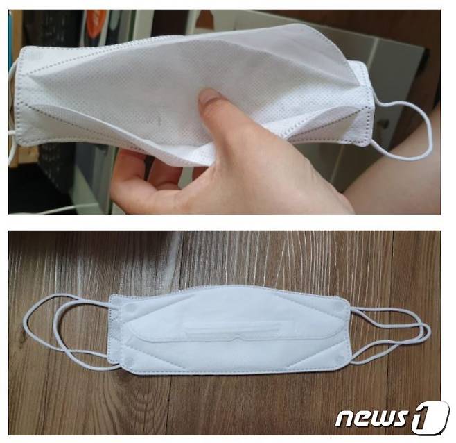 웰킵스 온라인몰에 올라온 비말마스크 구매 인증샷 © 뉴스1