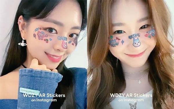 걸그룹 있지가 직접 그린 캐릭터 `윗지`가 인스타그램 카메라 효과로 등장했다. 네이버 라인프렌즈와 협업한 결과물이다. 직접 필터를 사용해 셀카를 찍은 있지 멤버 유나(왼쪽)와 채령.  [사진 제공 = WDZY 인스타그램 계정]