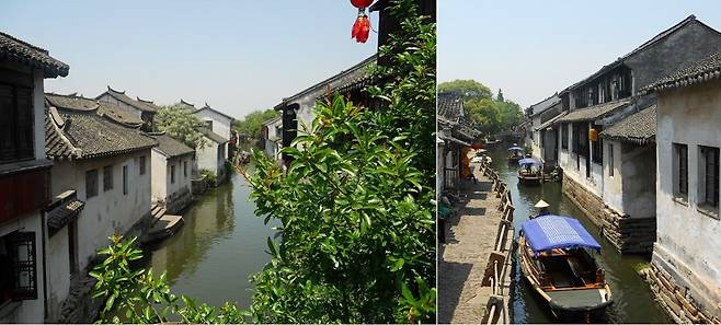 석교를 건너며 내려다본 중국 저우장의 뒷골목. 전통 가옥들 사이 좁은 수로를 따라 배들이 오간다. /사진=송경은 기자