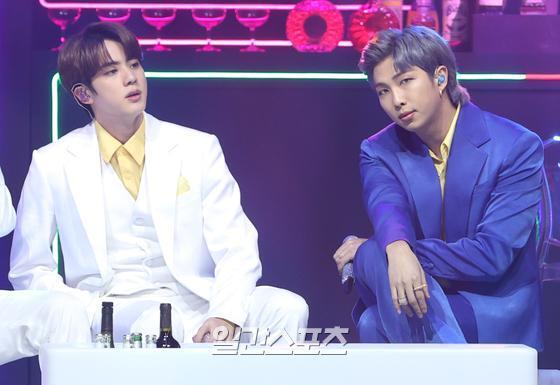 BTS (BTS) Jean and RM are showing off their great stage at the 35th 2021 Golden Disk Awards with Curaprox Digital Recording Awards held at KINTEX in Daehwa-dong, Gyeonggi-do on the afternoon of the 10th.35th 2021 Golden Disk Awards with Curaprox will be broadcast on JTBC, JTBC2 and JTBC4.