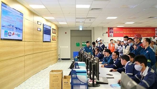 Song Hau 1 project officials check the operational status of plant No. 2 on Wednesday (Reuters)
