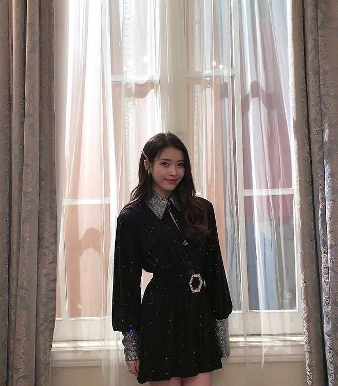 IU (real name Lee Ji-eun) posted several photos on her SNS on Thursday, along with a celebrity hashtag.The photo is a Celebrity special clip video behind-the-scenes cut released on YouTube One K channel on the 29th.IUs lovely visuals, posing throughout the classicly decorated set, capture Eye-catching.The fans who responded to the photos responded such as It is light, Love Live! It was the best and This time it is the same.On the other hand, IU announced the regular 5th album Celebrity on the 27th.