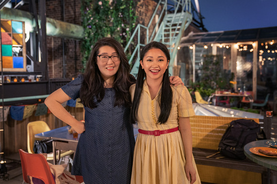 Original writer Jenny Han, left, and Lana Condor on the set of the film. [NETFLIX]