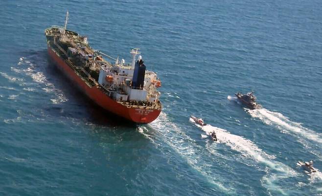 Vessels from Iran’s Islamic Revolutionary Guard Corps are in pursuit of the South Korean tanker Hankuk Chemi in the Persian Gulf on Jan. 4. (AP/Yonhap News)