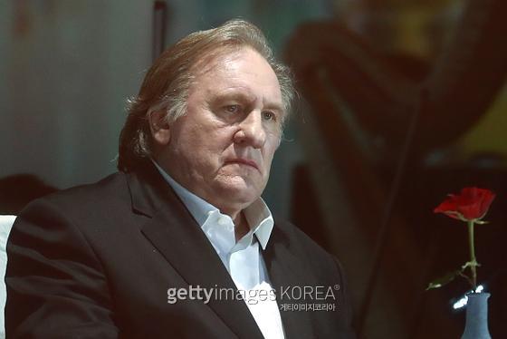 MOSCOW, RUSSIA APRIL 25, 2018: French actor Gerard Depardieu performs during a multimedia show in memory of Soviet actor and singer Vladimir Vysotsky, at the Rossiya Concert Hall in Luzhniki. Sergei Fadeichev/TASS (Photo by Sergei Fadeichev\TASS via Getty Images)