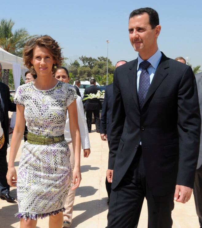 시리아의 바샤르 알아사드(오른쪽) 대통령과 그의 아내(왼쪽) /EPA 연합뉴스