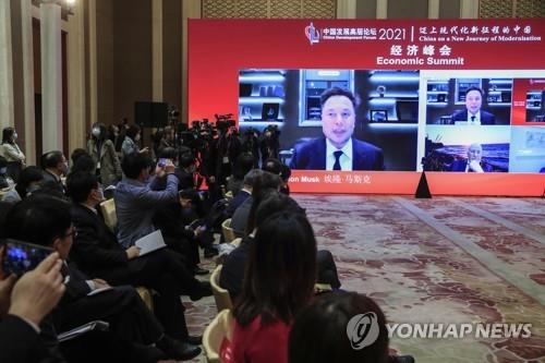 20일 베이징에서 열린 중국발전포럼에 화상으로 참석한 테슬라의 일론 머스크 CEO [EPA=연합뉴스 자료사진]