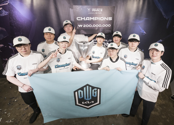 DWG KIA celebrate their 2021 League of Legends Champions Korea Spring Split victory at team headquarters. [RIOT GAMES]