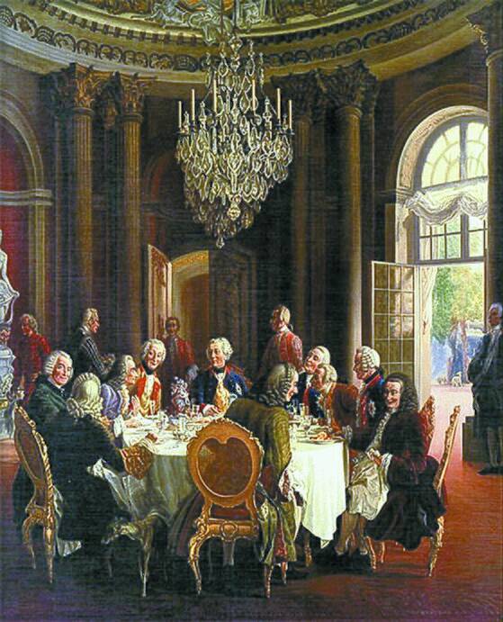프리드리히 대왕(테이블 맨 왼쪽에서 다섯째)이 포츠담에 있는 상수시궁전(아래 사진)에서 철학자 볼테르(맨 왼쪽에서 셋째)와 대화를 나누고 있다. [중앙포토]