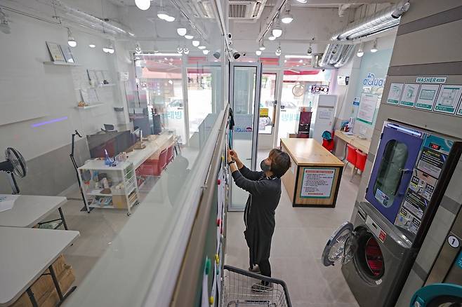 여행사 줄여 빨래방으로 임화영 기자