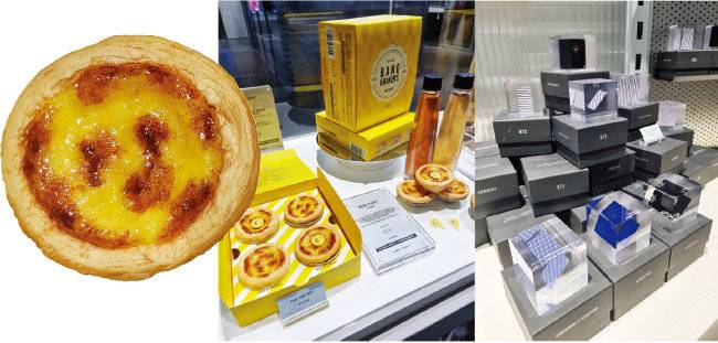 방문객에게 인기 있는 디저트 에그타르트(왼쪽). 아티스트가 무대에서 입었던 옷을 재활용해 만든 제품들. [구희언 기자]