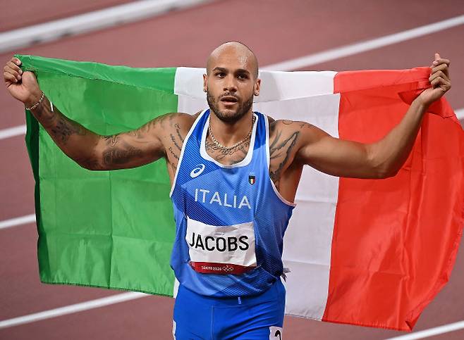 올림픽 남자 100m에서 이탈리아 선수로는 최초로 금메달을 차지한 마르셀 제이콥스. 사진=AP PHOTO