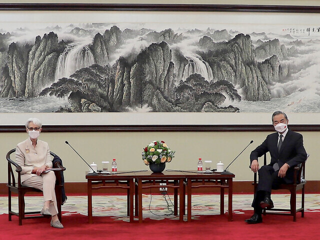 US Deputy Secretary of State Wendy Sherman and Chinese Foreign Minister Wang Yi pose for a photo during their meeting in Tianjin, China, on July 26. (AP/Yonhap News)