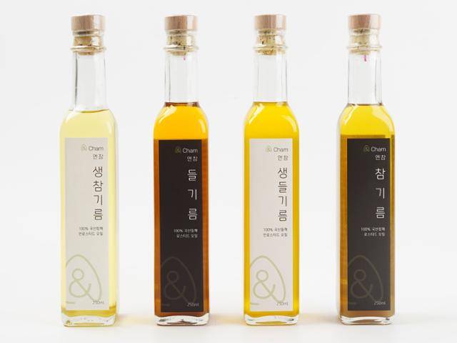 참기름, 들기름 제조업체 '엔참'의 유리병이 분리하기 쉬운 코르크 마개로 막혀 있다. 압착 뚜껑을 안 썼지만 품질이 떨어졌다는 항의를 받아본 적이 없다. 엔참 제공