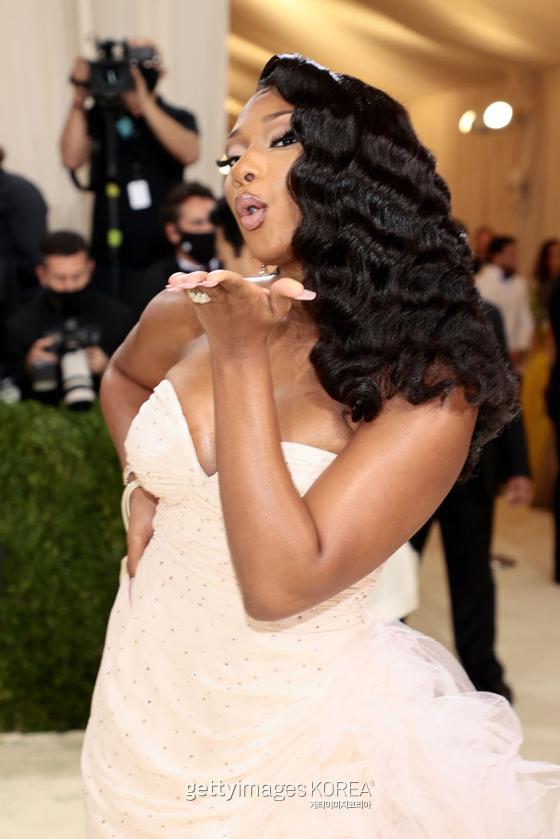 NEW YORK, NEW YORK - SEPTEMBER 13: Megan Thee Stallion attends The 2021 Met Gala Celebrating In America: A Lexicon Of Fashion at Metropolitan Museum of Art on September 13, 2021 in New York City. (Photo by Dimitrios Kambouris/Getty Images for The Met Museum/Vogue )