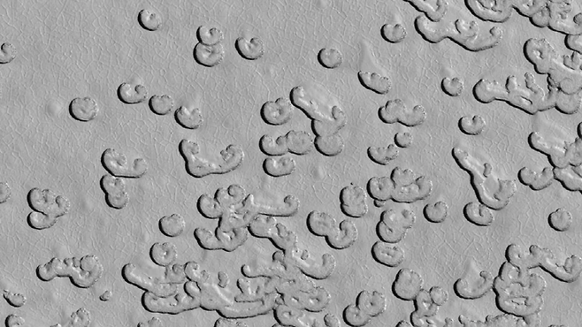 스위스 치즈 구덩이 지형. 사진=NASA/JPL/UArizona