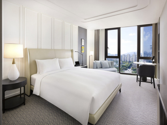 A room at Sofitel Ambassador Seoul offers a view of Seokchon Lake. [SOFITEL AMBASSADOR SEOUL]