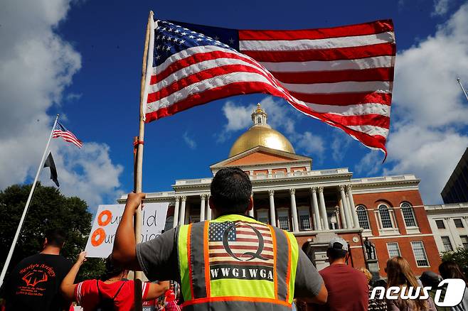 미국 보스턴에서 백신 접종을 거부하는 시위가 벌어지고 있다. © 로이터=뉴스1 © News1 정윤영 기자