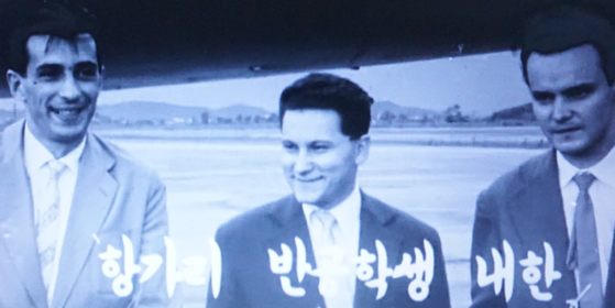 Hungarian anti-communist students at Youido International Airport in Seoul in July 1957. Karoly Derecskey is on the left. (Capture from the archive newsreel Daehan News.)