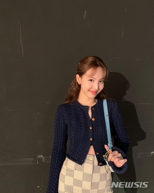 On the 29th, a photo of Nayeon was posted on the official Instagram account of TWICE. Nayeon is staring at the camera with a lovely smile.Nayeons innocent yet delicate figure in a gown knit cardigan and check skirt also catches the attention of fans.On the other hand, Nayeons group TWICE will be comeback on the 2nd of next month with Regular 3 Formula of Love: O + T=<3 (Formula of Love: O + T=<3).