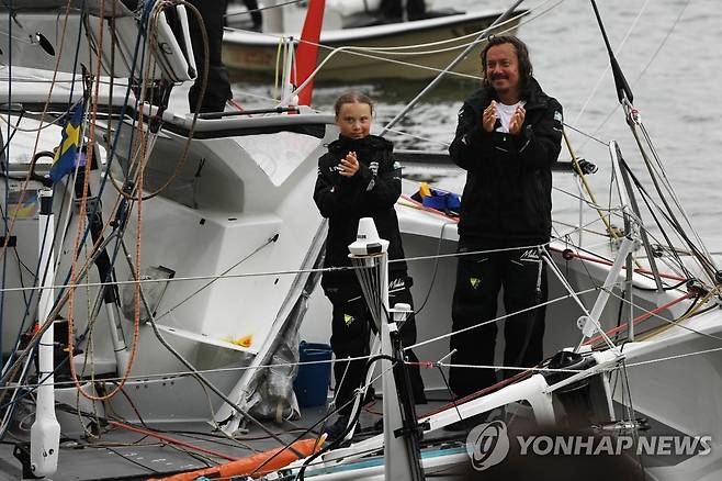 2019년 대서양을 횡단해 뉴욕에 도착한 툰베리 부녀 [AFP 연합뉴스 자료사진. 재판매 및 DB 금지]