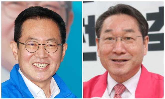 박남춘〈사진 왼쪽〉 더불어민주당 인천시장 후보와 유정복 국민의힘 인천시장 후보
