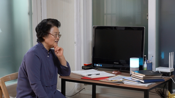 Kim Bun-ok, a 74-year-old living on her own in western Seoul, speaks to SK Telecom's Nugu AI speaker. [SK TELECOM]