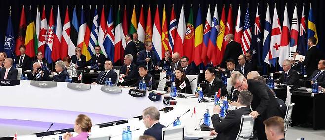 [마드리드=뉴시스] 전신 기자 = 윤석열 대통령이 29일(현지시간) 마드리드 이페마(IFEMA)에서 열린 나토 동맹국-파트너국 정상회의에 참석해 있다. 2022.06.29.