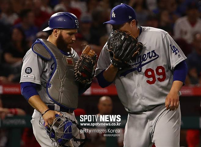 ▲ LA 다저스 시절 한솥밥을 먹었던 러셀 마틴(왼쪽)과 류현진.