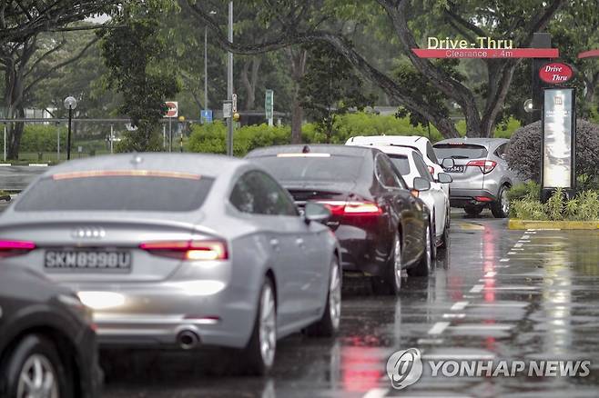 싱가포르 거리의 자동차들 [EPA 연합뉴스 자료사진. 재판매 및 DB 금지]