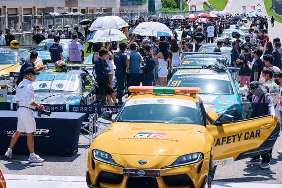 The fifth round of the 2022 Superrace Championship, individually named the Gangwon International Motor Festa, is held at Inje Speedium, in Inje, Gangwon, on Monday. A grid walk event, where drivers and cars can be seen up close and personal, is open during the event. [YONHAP]