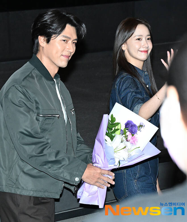 Actors Hyun Bin and Yim Yuna attend the stage greeting of the movie Confidential Assignment 2: International at CGV Wangsimni in Seongdong-gu, Seoul, on the afternoon of September 12.