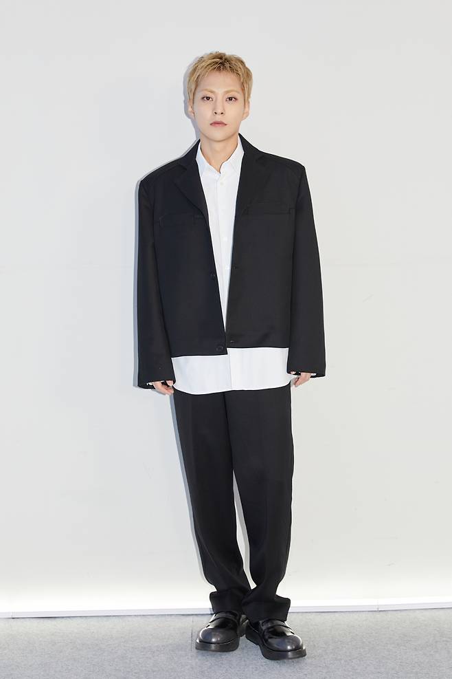 Xiumin of boy band EXO poses during an online press conference held for his first solo album, “Brand New,” on Monday. (SM Entertainment)