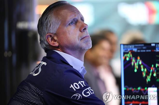 NYSE 입회장에 트레이더의 모습