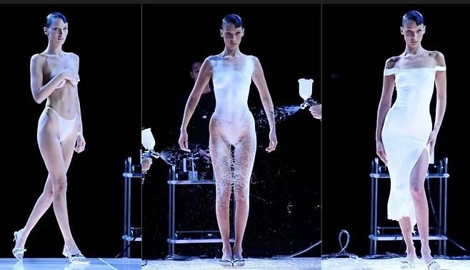 속옷 차림으로 무대에 올랐던 벨라 하디드는 쇼가 끝나자 화이트 드레스를 입은 모습으로 변신했다. /AFP=연합뉴스