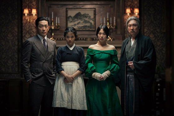 “The Handmaiden” (2016) starring Ha Jung-woo, Kim Tae-ri, Kim Min-hee and Cho Jin-woong is inspired by the 2002 novel “Fingersmith” by Sarah Waters. The film is director Park Chan-wook’s and Jeong Seo-kyeong’s fourth film together. The film was invited to compete for the Palme d’Or at the 2016 Cannes Film Festival. [CJ ENM]