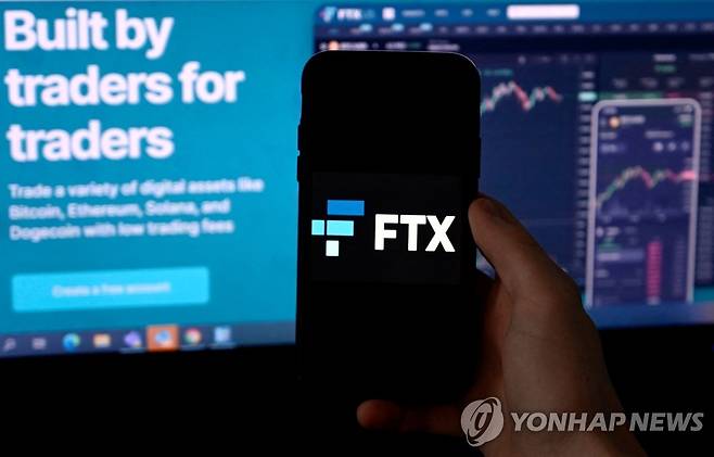 FTX 로고와ㅣ 홈페이지 [AFP 연합뉴스 자료사진. 재판매 및 DB 금지]