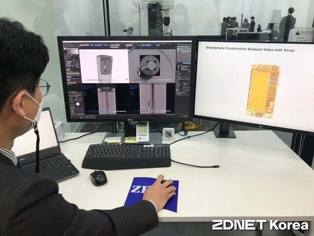 자이스 직원이 23일 경기 화성시 동탄연구소에서 장비로 촬영한 사진을 보여주고 있다. 왼쪽 화면은 2차전지 배터리, 오른쪽은 스마트폰을 찍은 화면(사진=유혜진 기자)