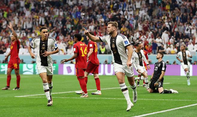 Soccer Football - FIFA World Cup Qatar 2022 - Group E - Spain v Germany - Al Bayt Stadium, Al Khor, Qatar - November 27, 2022 Germany's Niclas Fullkrug celebrates scoring their first goal with Jamal Musiala REUTERS/Matthew Childs     TPX IMAGES OF THE DAY