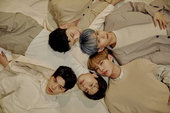 A concept image for WeNU's debut EP "Haru Haru," which dropped Wednesday [IRION ENTERTAINMENT]