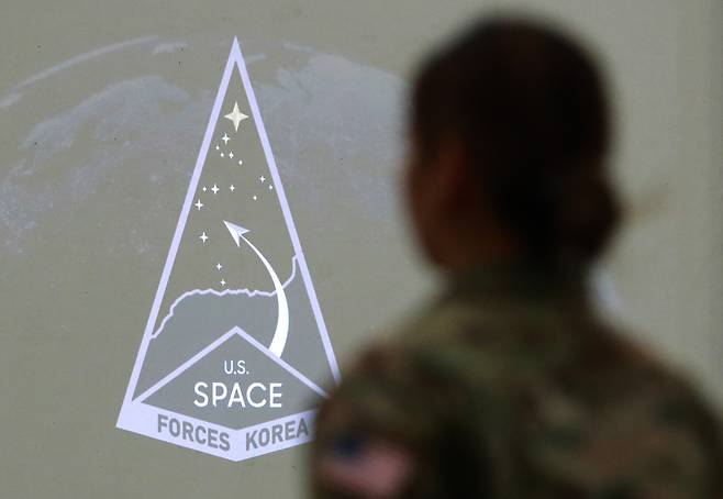 A US Space Forces Korea patch is unveiled during the activation ceremony at Osan Air Base in Pyeongtaek, Gyeonggi Province, Wednesday.(Joint Press Corps - Yonhap)